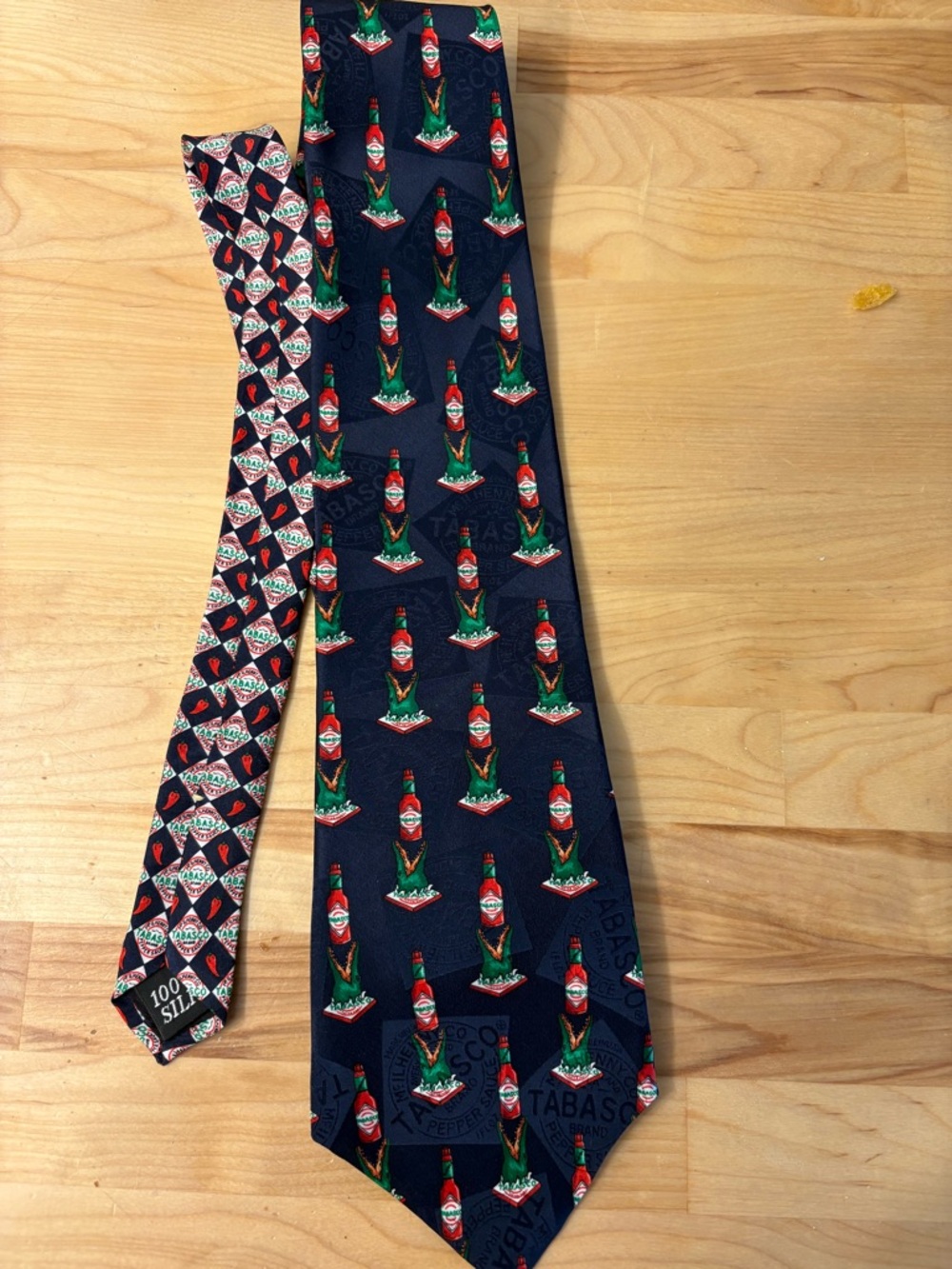 Tabasco Navy Silk Tie with Red & Green Bottle Motif